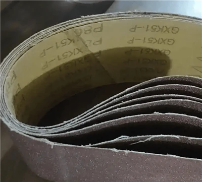 샌딩 벨트의 재료와 구조는 무엇이며, 연삭 효과에 어떤 영향을 미칩니 까?